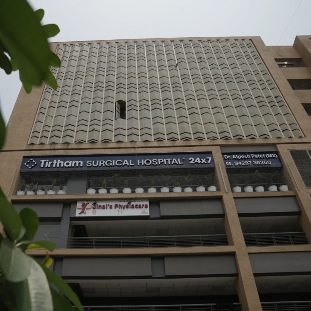 Tirtham Surgical Hospital building, Science City Road, Ahmedabad